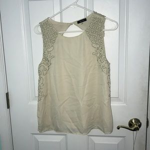 Sleeveless pretty cream shirt